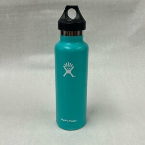 Hydro Flask brand metal water bottle 21oz mint green color